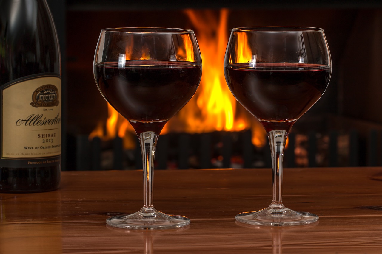 red wine, glasses, log fire-2443699.jpg